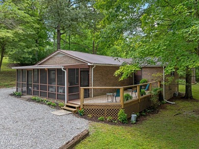 Charming brick cottage with seasonal lake views on 2.36 - photo 1