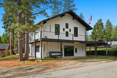 Experience contemporary mountain living in this fully renovated - photo 2