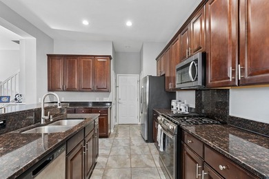Stunning and spacious, this expansive end-unit residence offers - photo 13