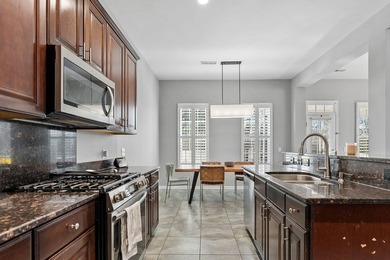 Stunning and spacious, this expansive end-unit residence offers - photo 16