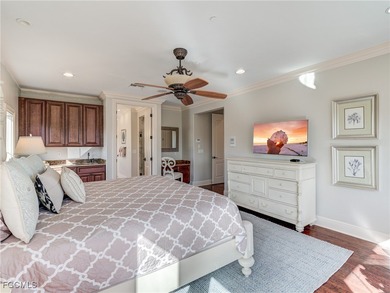 Experience the timeless coastal allure of 15160 Captiva Drive, a - photo 12