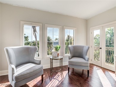 Experience the timeless coastal allure of 15160 Captiva Drive, a - photo 14