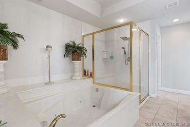 Enjoy exceptional lake living in this beautifully renovated