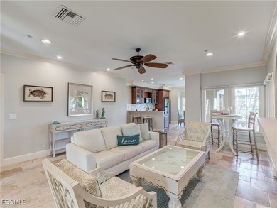 Experience the timeless coastal allure of 15160 Captiva Drive, a - photo 21