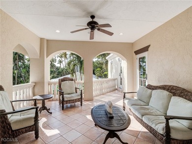 Experience the timeless coastal allure of 15160 Captiva Drive, a - photo 27