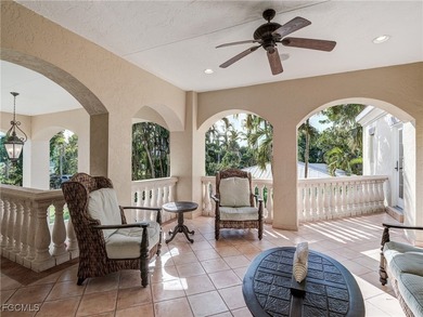 Experience the timeless coastal allure of 15160 Captiva Drive, a - photo 28