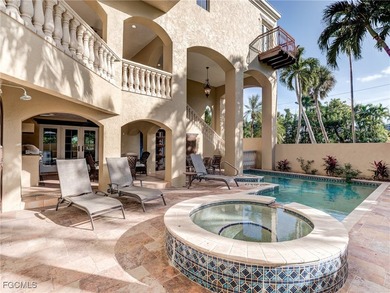 Experience the timeless coastal allure of 15160 Captiva Drive, a - photo 34