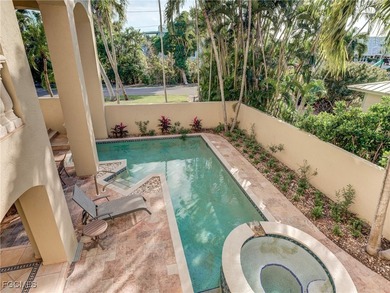 Experience the timeless coastal allure of 15160 Captiva Drive, a - photo 35