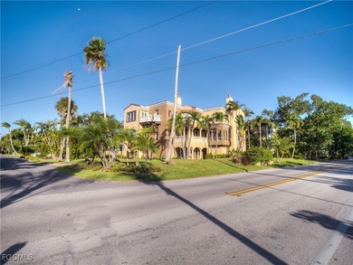 Experience the timeless coastal allure of 15160 Captiva Drive, a - photo 39