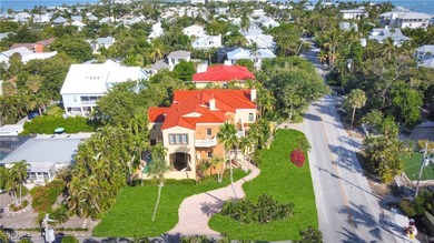 Experience the timeless coastal allure of 15160 Captiva Drive, a - photo 41