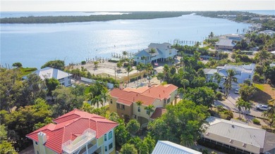 Experience the timeless coastal allure of 15160 Captiva Drive, a - photo 42