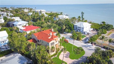 Experience the timeless coastal allure of 15160 Captiva Drive, a - photo 43