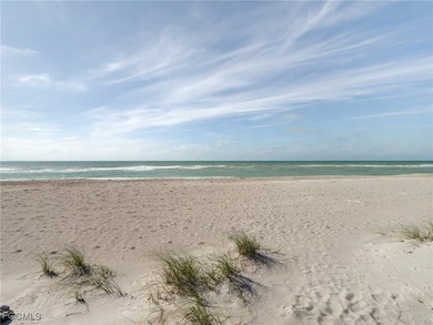 Experience the timeless coastal allure of 15160 Captiva Drive, a - photo 45