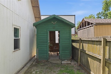 Step into a rare piece of Bentonville history, located in the - photo 48