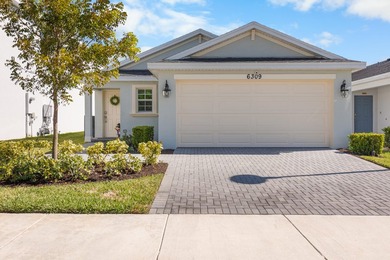 This new single-story home features a smart layout designed for - photo 7