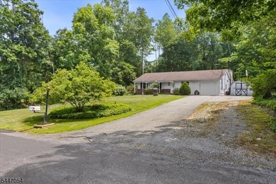 Easy one floor living in this expanded Ranch situated on nearly - photo 1