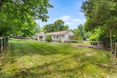 Easy one floor living in this expanded Ranch situated on nearly - photo 2