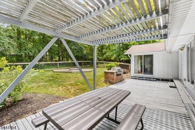 Easy one floor living in this expanded Ranch situated on nearly - photo 3
