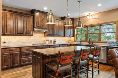 Discover an extraordinary lakefront estate on prestigious - photo 19