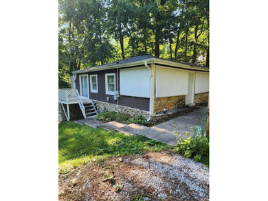 Welcome to this charming 2-bedroom, 1-bath home offering an - photo 1