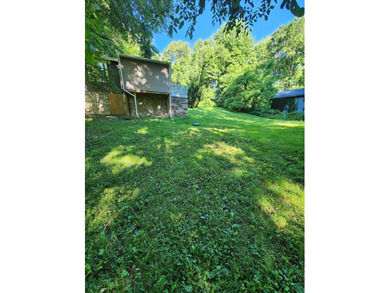 Welcome to this charming 2-bedroom, 1-bath home offering an - photo 8