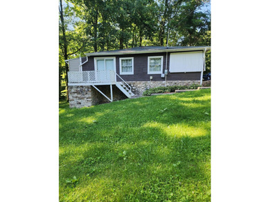 Welcome to this charming 2-bedroom, 1-bath home offering an - photo 10