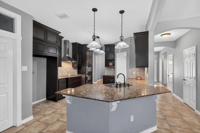 Step into this beautiful 4-bedroom, 3-bath home offering both - photo 15