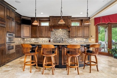 Set on more than 22 acres of private, manicured grounds, this - photo 19