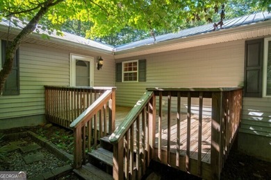 What a rare gem! Imagine 4 wooded and private acres, 750ft - photo 9