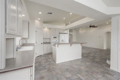 This Pool home residence maximizes natural light, stunning views