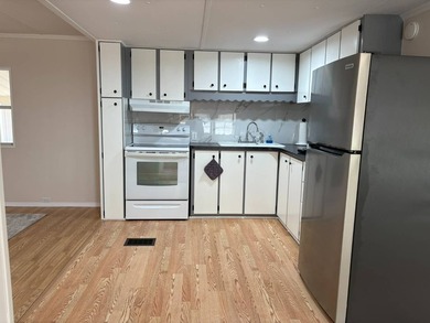 Don't miss out on this beautifully remodeled 2-bedroom, 1.5-bath - photo 8
