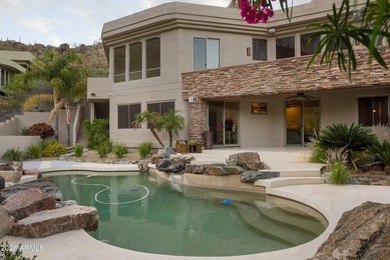 A fabulous hillside contemporary located in Tatum Canyon. This 5