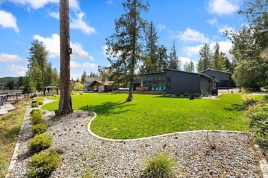 Set along the water's edge on a .44-acre lot, this beautifully - photo 32