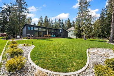 Set along the water's edge on a .44-acre lot, this beautifully - photo 34