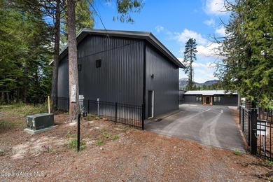 Set along the water's edge on a .44-acre lot, this beautifully - photo 40