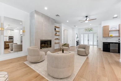 Over $300,000 in renovations. Custom single-story estate in an - photo 11