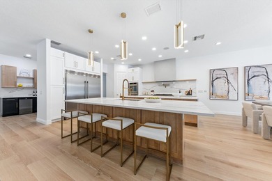 Over $300,000 in renovations. Custom single-story estate in an - photo 12