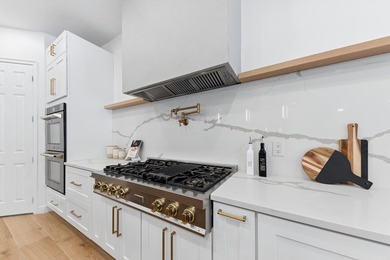 Over $300,000 in renovations. Custom single-story estate in an - photo 13