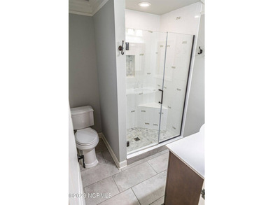 This beautiful, renovated ranch home is ideally situated on the - photo 18