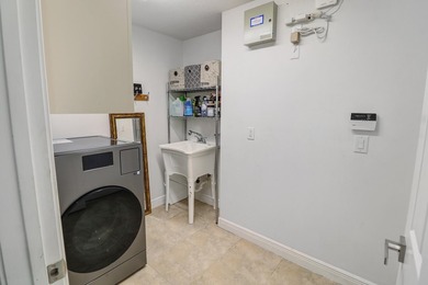 This home offers Luxury living with Expansive Golf Views! NO