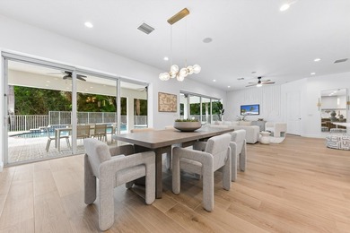 Over $300,000 in renovations. Custom single-story estate in an - photo 18