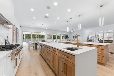 Over $300,000 in renovations. Custom single-story estate in an - photo 24
