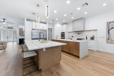 Over $300,000 in renovations. Custom single-story estate in an - photo 27