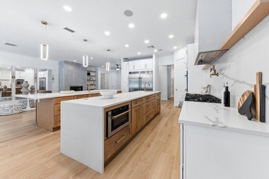 Over $300,000 in renovations. Custom single-story estate in an - photo 30