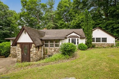 Storybook charm! This inviting two-bedroom cottage sits - photo 3
