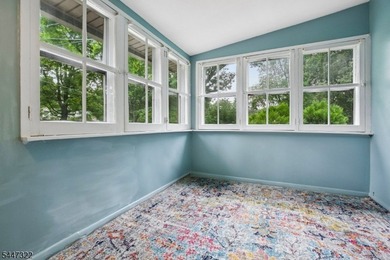Storybook charm! This inviting two-bedroom cottage sits - photo 10