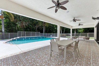 Over $300,000 in renovations. Custom single-story estate in an - photo 50