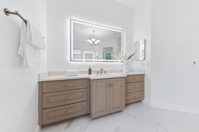 Over $300,000 in renovations. Custom single-story estate in an - photo 58