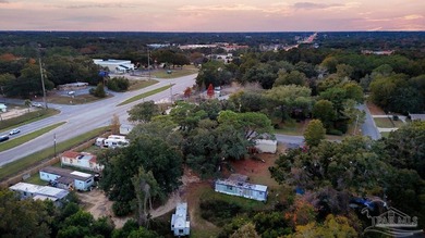 1.3 acre parcel with over 200 feet of road frontage on 9-Mile Rd - photo 3