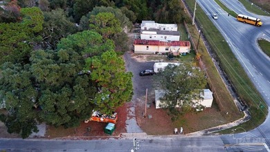 1.3 acre parcel with over 200 feet of road frontage on 9-Mile Rd - photo 6